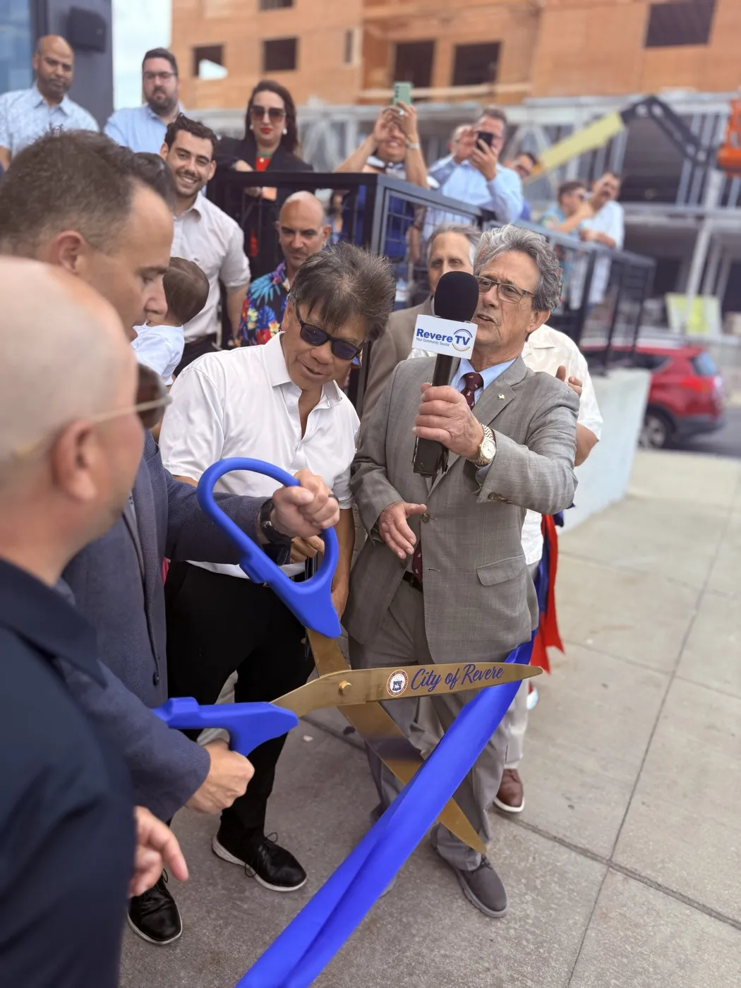 A ribbon cutting with the Revere business community.